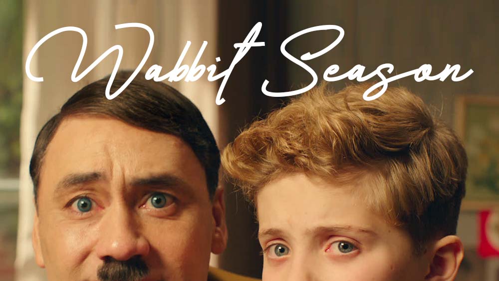 Photo of the German boy from Jojo Rabbit with his imaginary friend, Adolf Hitler.